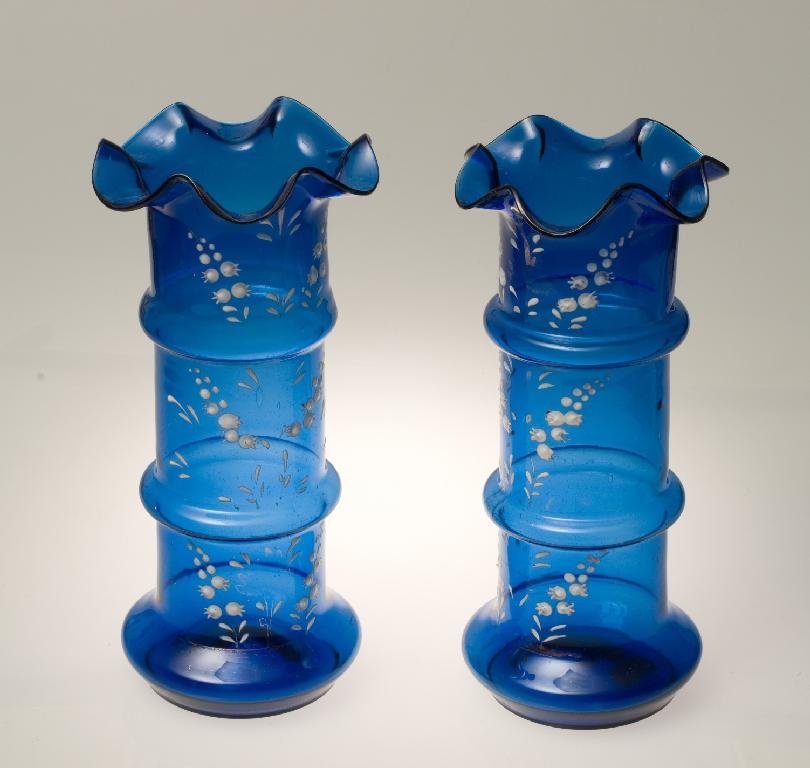 Appraisal: PAIR OF LATE VICTORIAN BLUE GLASS VASES each with undulating