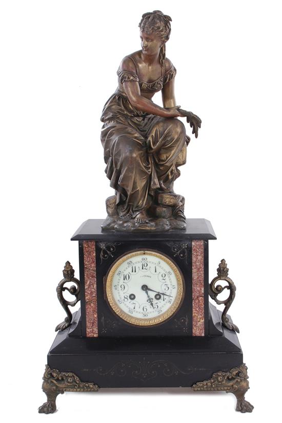 Appraisal: French slate and rouge marble figural mantel clock late th