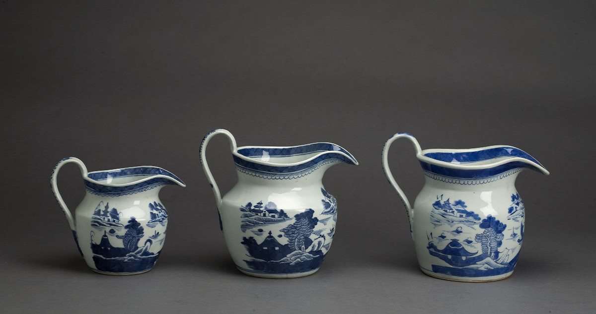 Appraisal: TWO CANTON PORCELAIN BLUE AND WHITE CIDER JUGS NINETEENTH CENTURY