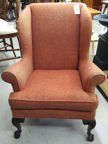 Appraisal: CHIPPENDALE STYLE WINGBACK ARMCHAIR American early th century the front