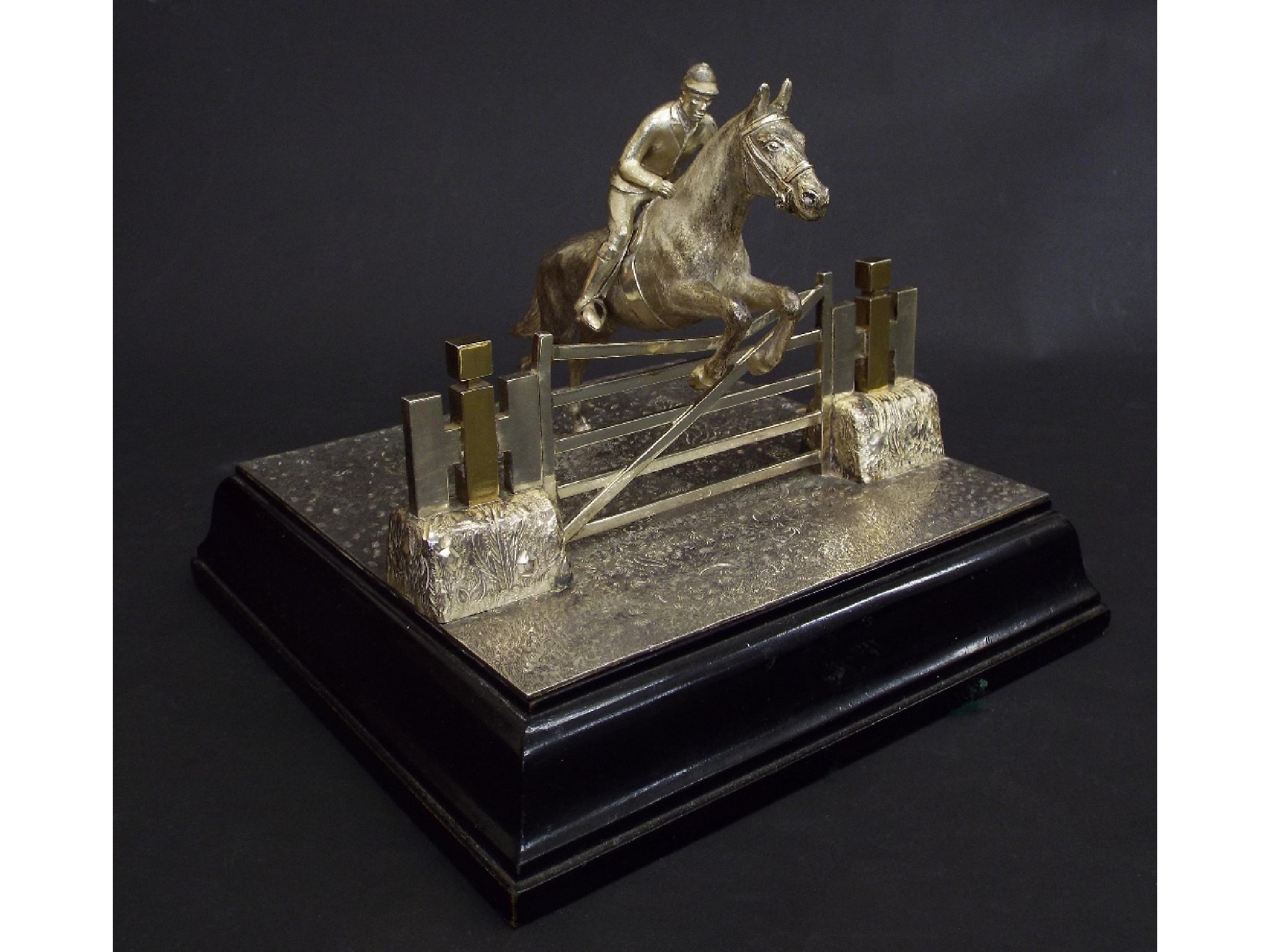 Appraisal: Equestrian Interest - s cast silver character group of a