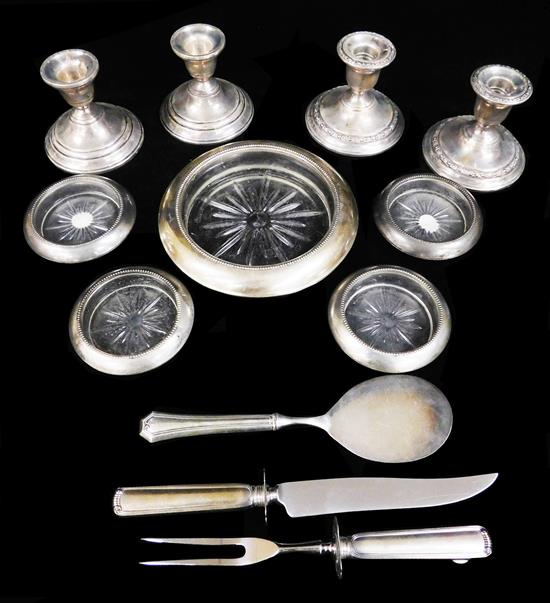 Appraisal: STERLING Twelve pieces of sterling weighted four candle holders carving