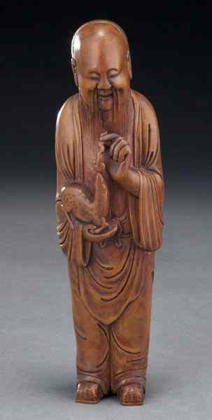 Appraisal: Chinese carved boxwood God of Longevity holding a deer in