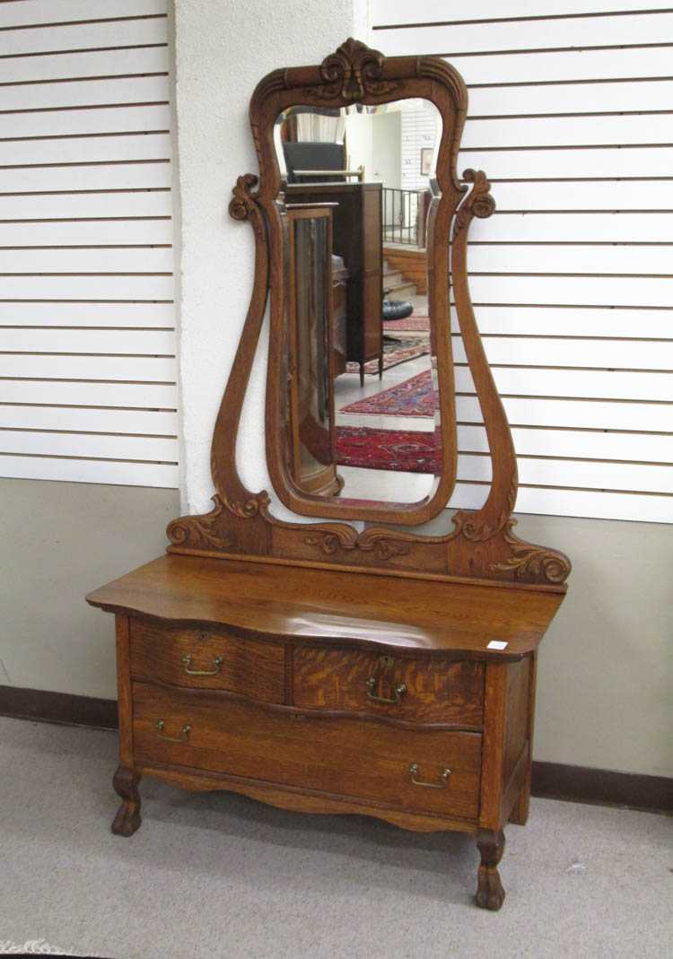 Appraisal: LATE VICTORIAN LOW OAK DRESSER WITH TILT MIRROR American late