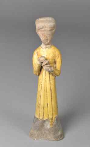 Appraisal: A Chinese Tang Pottery Figure of a LadyMolded to depict