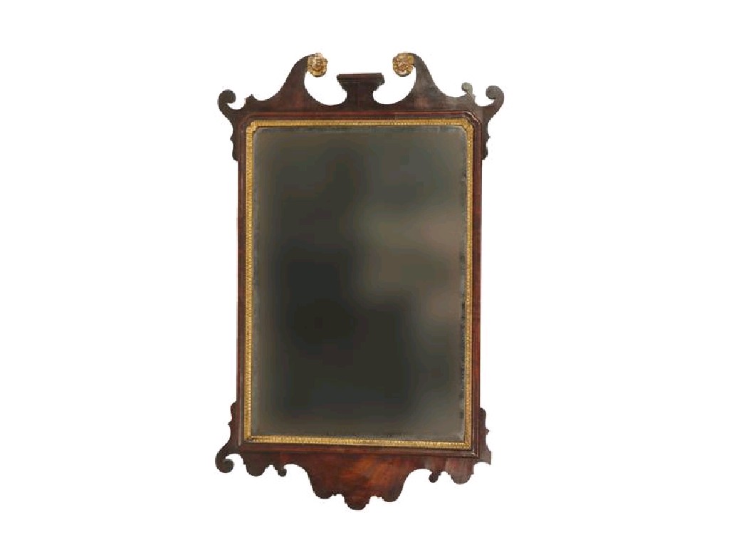 Appraisal: A GEORGE II MAHOGANY AND PARCEL-GILT FRETWORK WALL MIRROR apparently