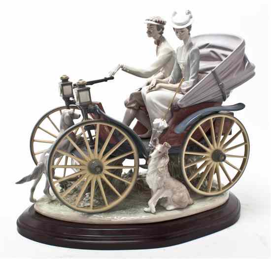 Appraisal: A Lladro Porcelain Figural Group A Sunday Drive depicting a