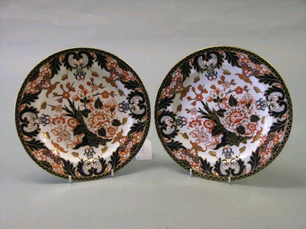 Appraisal: A pair of Victorian Crown Derby plates printed and gilded