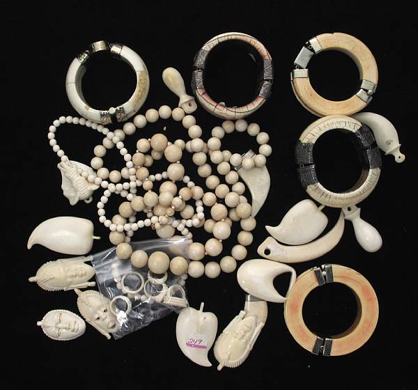 Appraisal: A collection of ivory bone silver and metal jewelry including