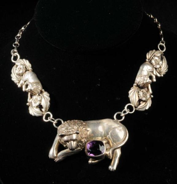 Appraisal: Lion Necklace with Amethyst Stone Description Marked Sterling Two small