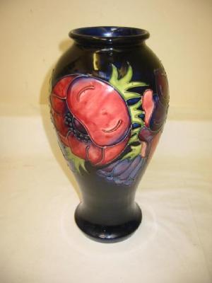 Appraisal: A MOORCROFT POTTERY VASE of baluster form tube lined in