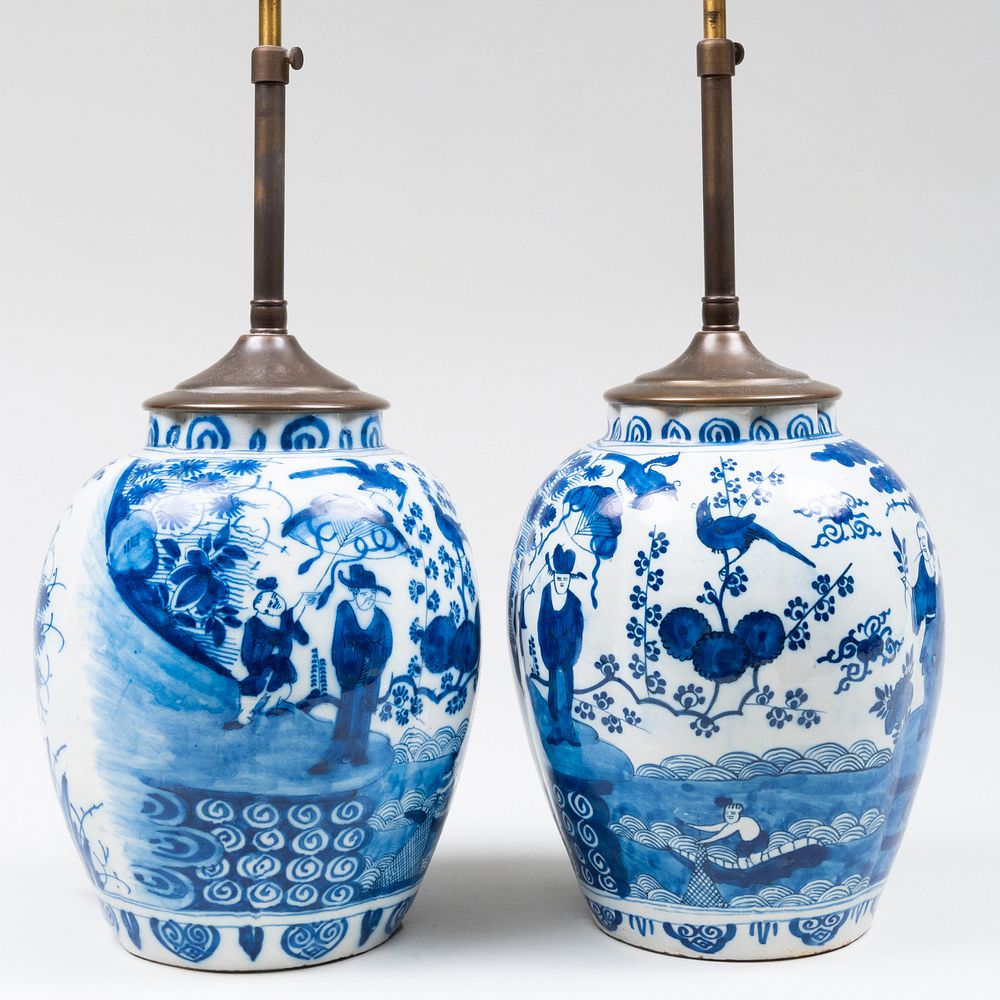 Appraisal: Pair of Delft Blue and White Jars Mounted as Lamps