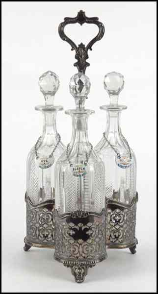 Appraisal: SET OF THREE CRYSTAL DECANTERS Contained in a silverplate stand