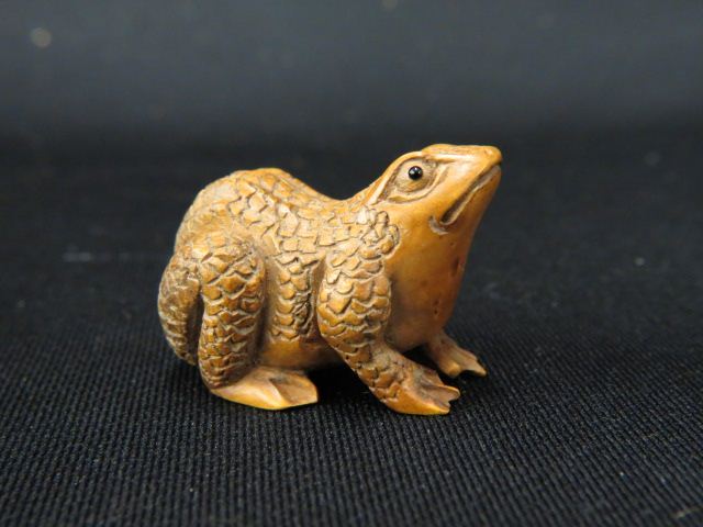 Appraisal: Carved Wood Netsuke of a Toad onyx eye long signed