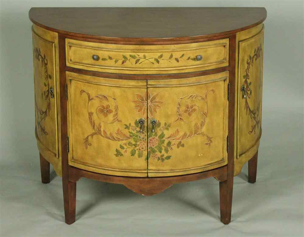 Appraisal: EDWARDIAN STYLE WALNUT PAINT DECORATED DEMI LUNE COMMODE having a