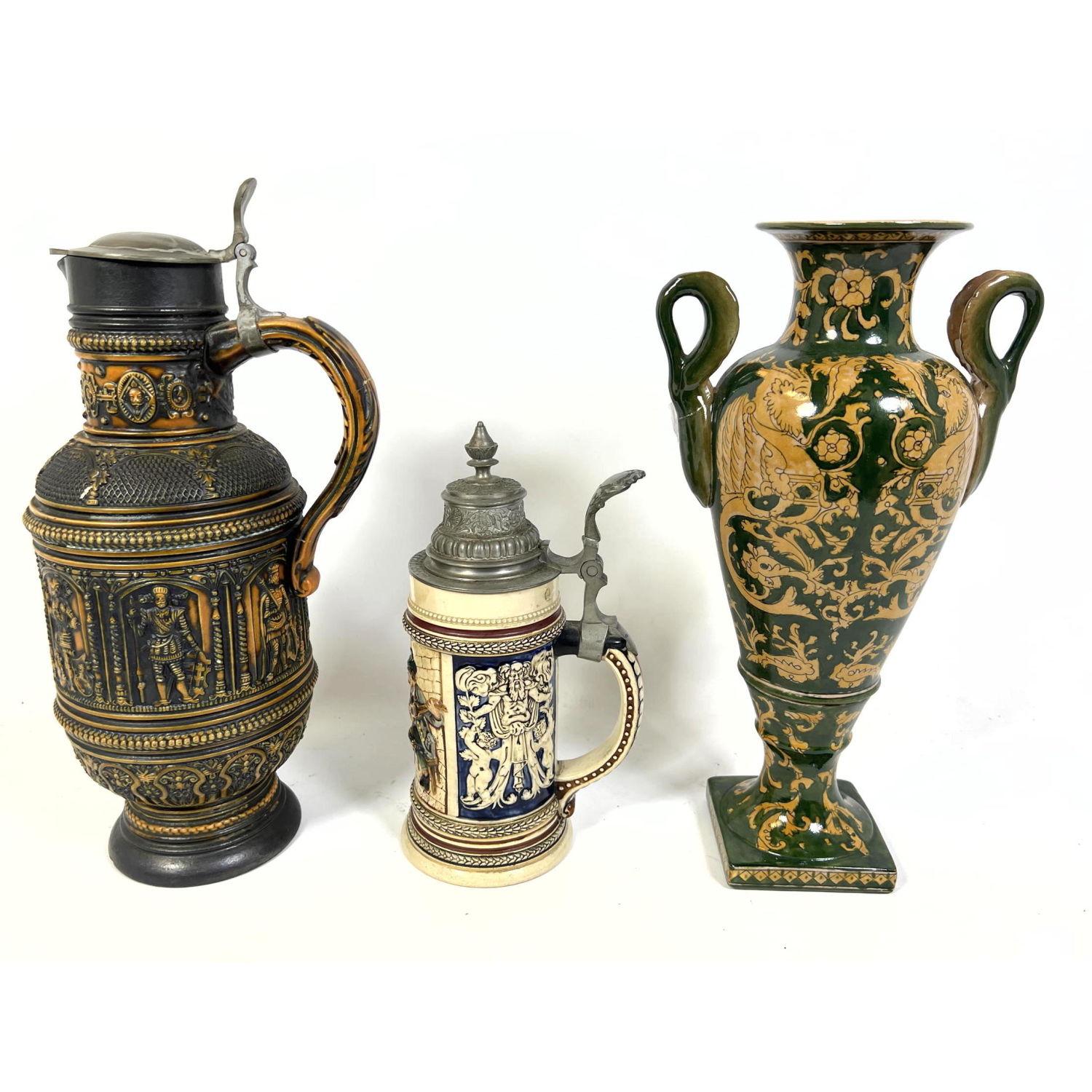 Appraisal: Two Pottery Steins One Tall Handled Urn Vase Marked Made