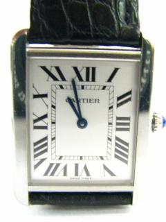 Appraisal: Description Cartier Tank Watch Swiss made quartz watch stainless steel