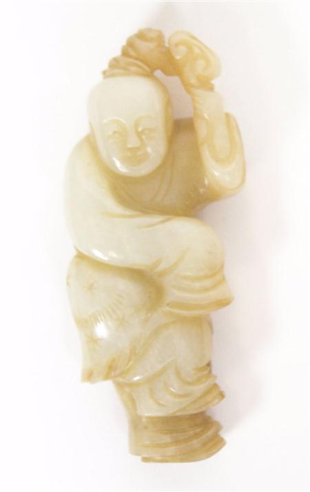 Appraisal: A Chinese white and light brown jade standing figure Qing