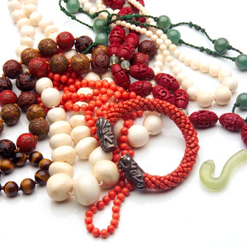 Appraisal: ORIENTAL Bead jewelry three antique ivory strands one spherical mm-