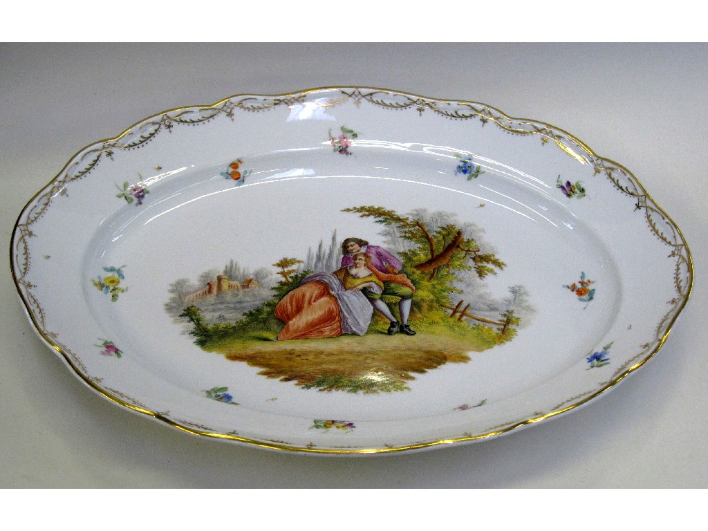 Appraisal: Meissen oval shaped dish with scalloped rim decorated with a