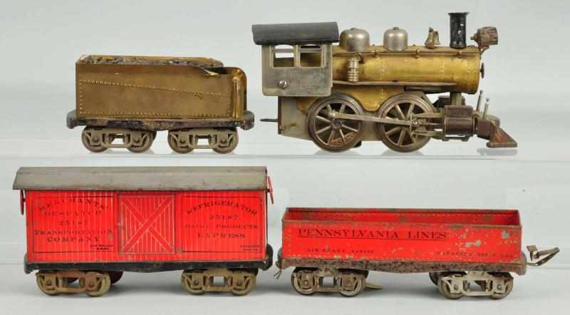 Appraisal: Elektoy Freight Train Set Description Includes brass locomotive and tender