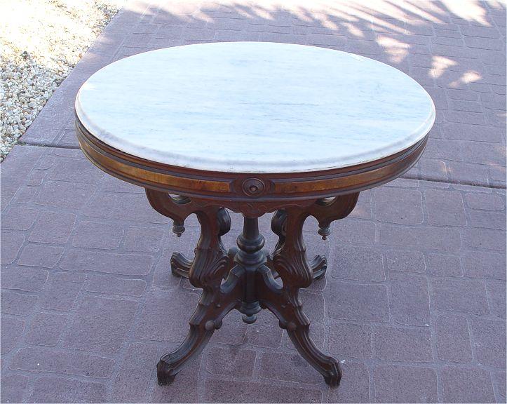 Appraisal: RENAISSANCE REVIVAL VICTORIAN WALNUT MARBLE TOP TABLE White marble oval