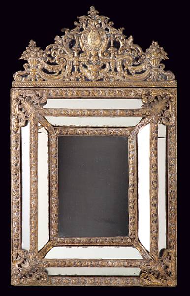 Appraisal: A Flemish Baroque style gilt and silver gilt repouss mirror