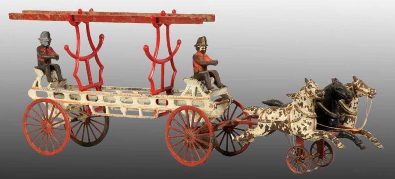 Appraisal: Cast Iron Wilkins Horse-Drawn Ladder Wagon Toy Description Made by