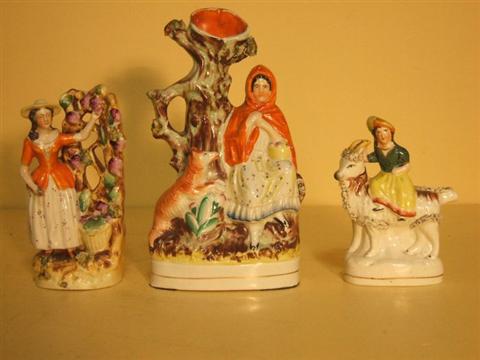 Appraisal: THREE STAFFORDSHIRE GROUPS Late th century including a Little Red