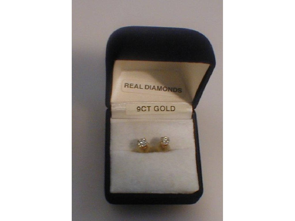 Appraisal: A pair of diamond ear studs ct approx total