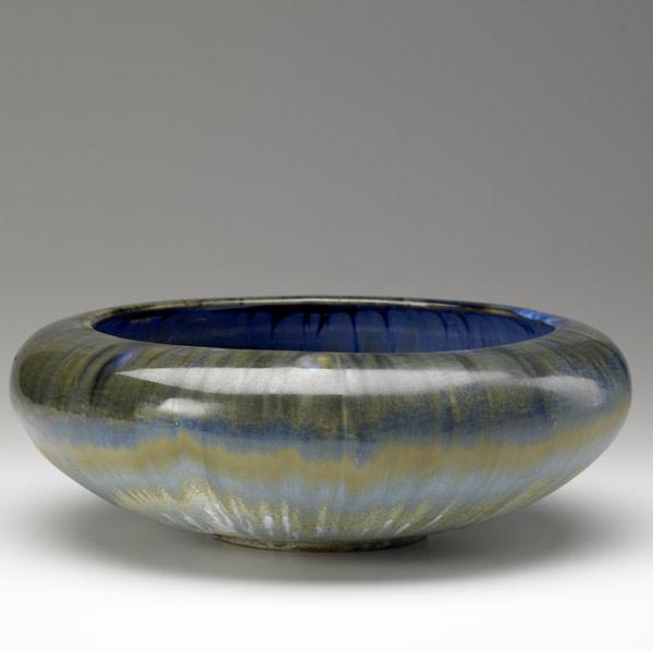 Appraisal: FULPER Large center bowl with blue and ivory flambe interior