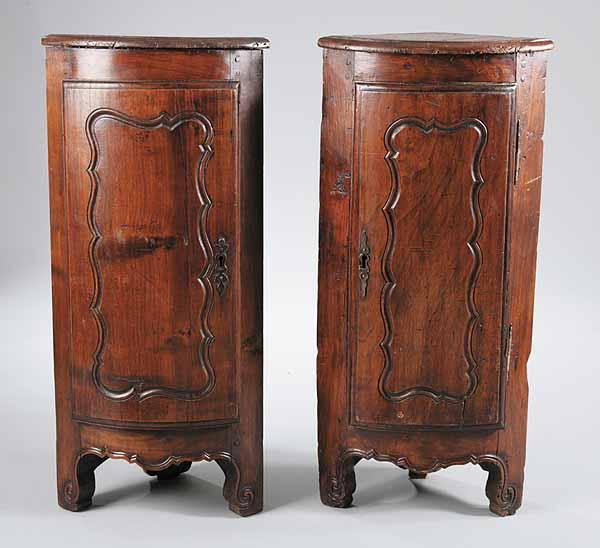 Appraisal: A Pair of Provincial Louis XV Walnut Encoignures late th