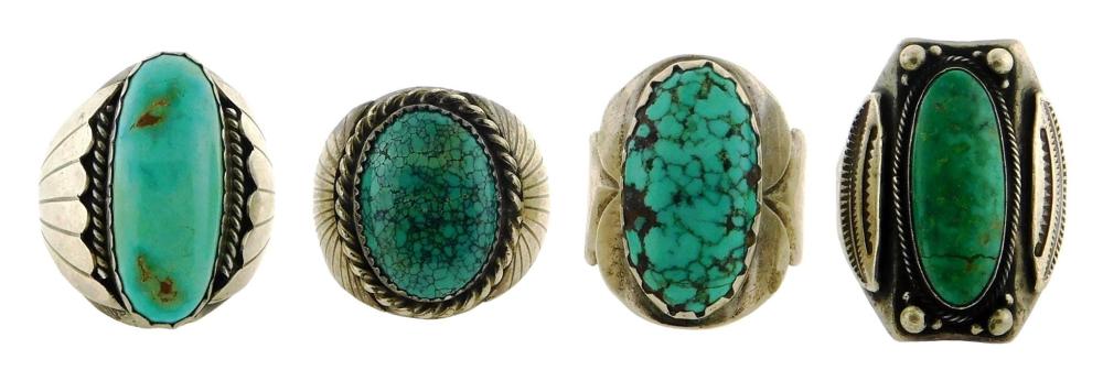 Appraisal: Four Southwestern solitaire style silver rings set with greenish turquoise