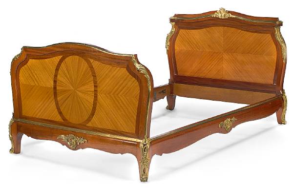 Appraisal: A pair of Louis XV style gilt bronze mounted inlaid