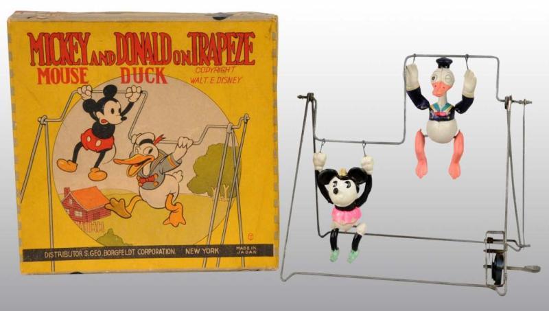 Appraisal: Mickey Mouse Donald Duck Acrobats in Orig Box Description Tin