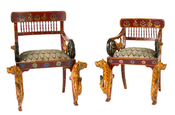 Appraisal: A pair of paint decorated figural armchairs in the Folk