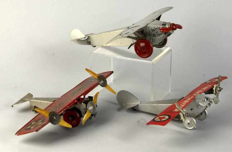 Appraisal: Lot of Tin Litho Airplane Wind-Up Toys Description American Working