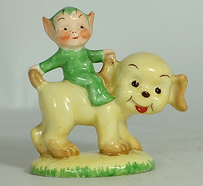 Appraisal: Shelley figure of Imp riding a puppy dog by Mable