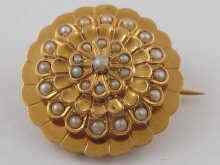 Appraisal: A yellow metal tests carat gold circular brooch set with