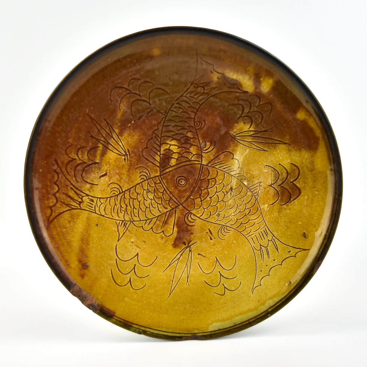 Appraisal: Japanese th C ceramic plate carved with three fish patterns