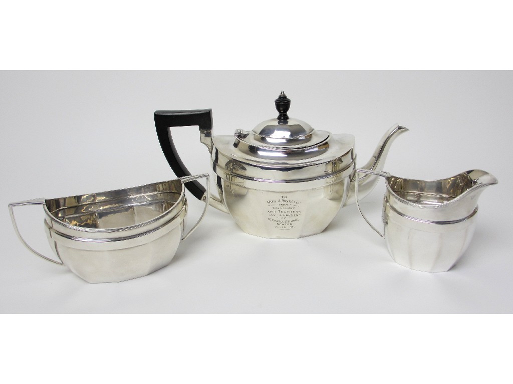 Appraisal: A three piece silver tea service by Barker Bros Silver