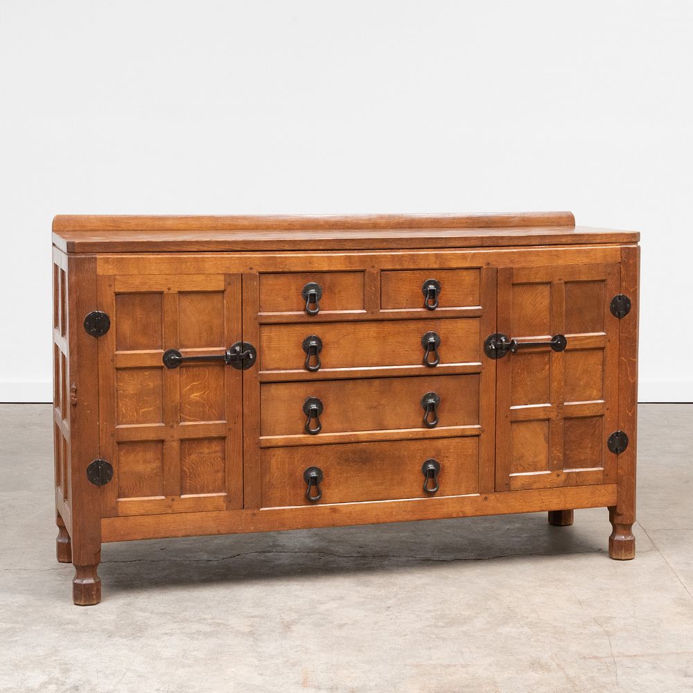 Appraisal: Robert 'Mouseman' Thompson Iron-Mounted Oak Sideboard Two cupboards fitted with