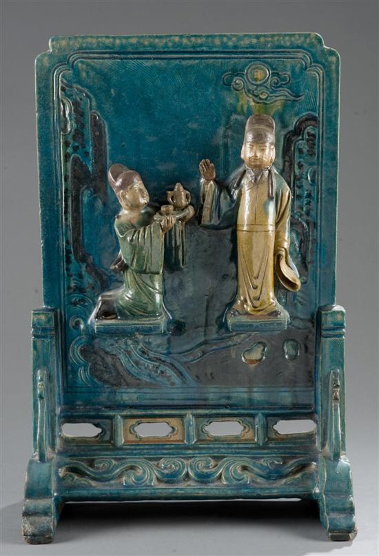 Appraisal: Chinese pottery table screen with applied figures Blue glazed rectangular