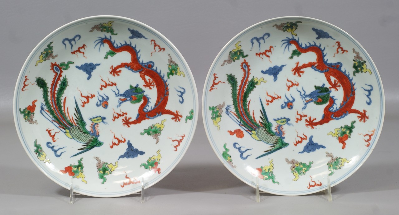 Appraisal: Pair of Chinese Doucai Shallow Bowls with phoenix and dragon