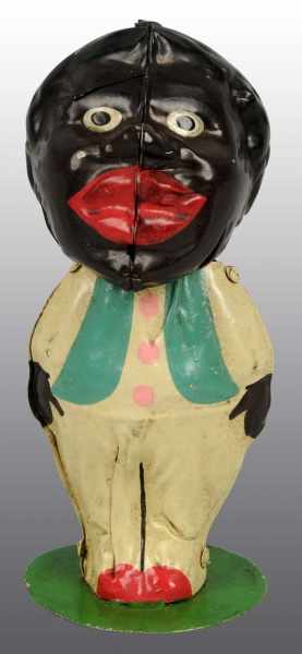 Appraisal: Tin Handpainted African American Nodder Toy Description German Nicely handpainted