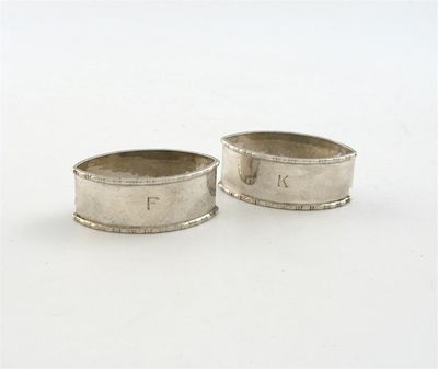 Appraisal: By Liberty and Co a pair of silver napkin rings