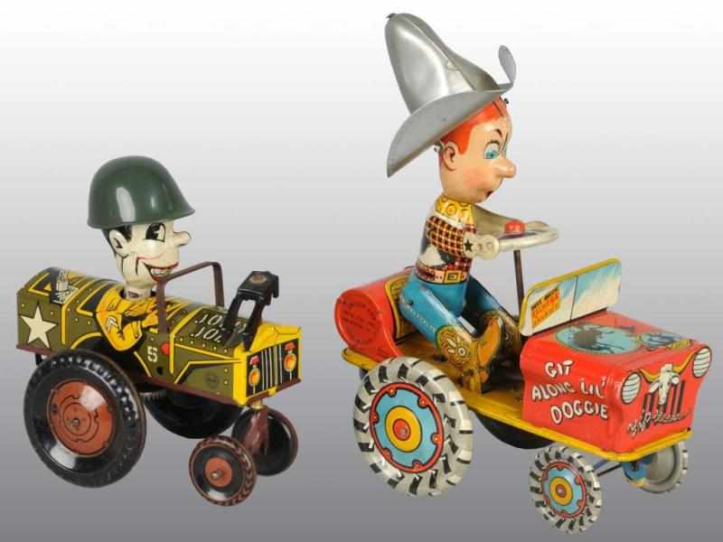 Appraisal: Lot of Tin Whoopee Car Wind-Up Toys Description American Working