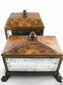 Appraisal: Two caskets with mirror sides and pent lids on cast