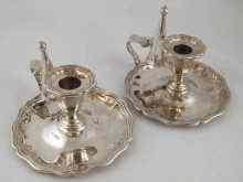 Appraisal: A matched pair of silver chamber candlesticks with extinguishers Martin