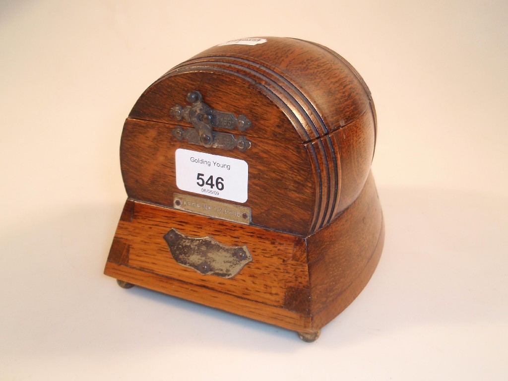 Appraisal: A s oak cigarette box with Swiss music box base